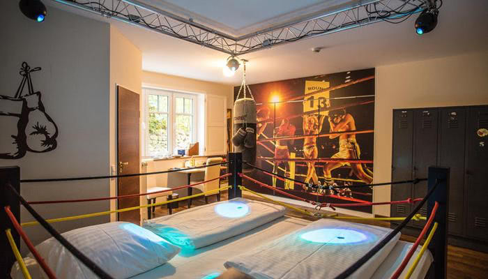 View into the boxing ring theme room in the Beverland group resort